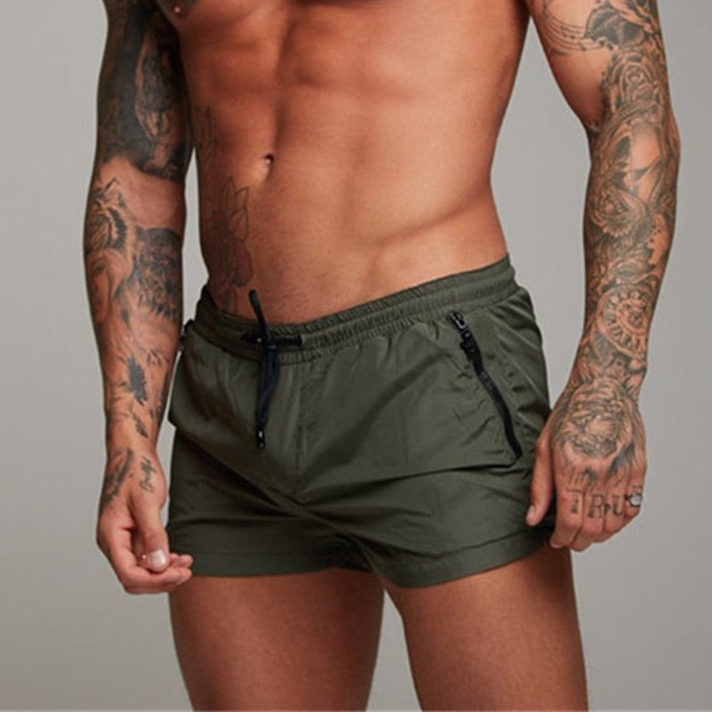 Nuevo traje de baño para hombre, traje de baño Sexy, pantalones cortos de natación para hombre, calzoncillos para hombre, pantalones cortos de playa, trajes deportivos, pantalones cortos para tabla de Surf, bañadores para hombre 