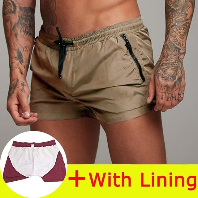 Nuevo traje de baño para hombre, traje de baño Sexy, pantalones cortos de natación para hombre, calzoncillos para hombre, pantalones cortos de playa, trajes deportivos, pantalones cortos para tabla de Surf, bañadores para hombre 