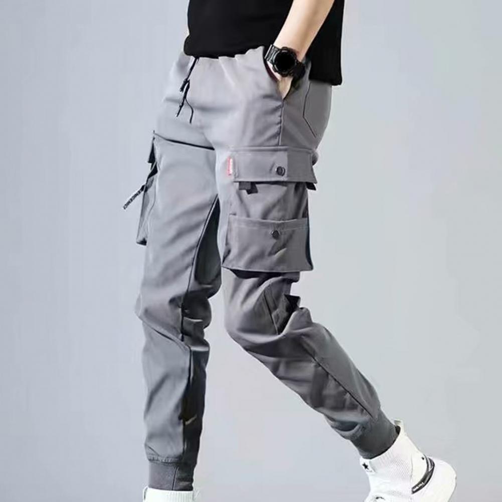 Pantalones de otoño para hombre, pantalones para correr estilo harén de Hip Hop, nuevos pantalones para hombre, pantalones Cargo lisos con múltiples bolsillos, pantalones de chándal estilo ceñido