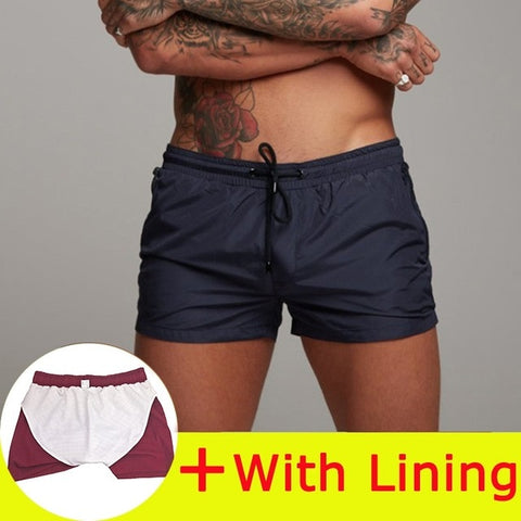 Nuevo traje de baño para hombre, traje de baño Sexy, pantalones cortos de natación para hombre, calzoncillos para hombre, pantalones cortos de playa, trajes deportivos, pantalones cortos para tabla de Surf, bañadores para hombre 