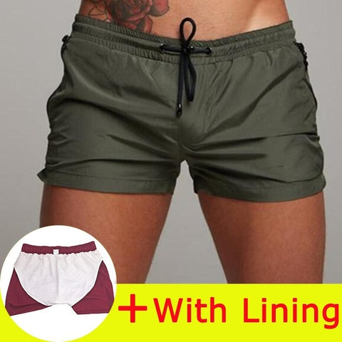 Nuevo traje de baño para hombre, traje de baño Sexy, pantalones cortos de natación para hombre, calzoncillos para hombre, pantalones cortos de playa, trajes deportivos, pantalones cortos para tabla de Surf, bañadores para hombre 