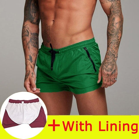 Nuevo traje de baño para hombre, traje de baño Sexy, pantalones cortos de natación para hombre, calzoncillos para hombre, pantalones cortos de playa, trajes deportivos, pantalones cortos para tabla de Surf, bañadores para hombre 